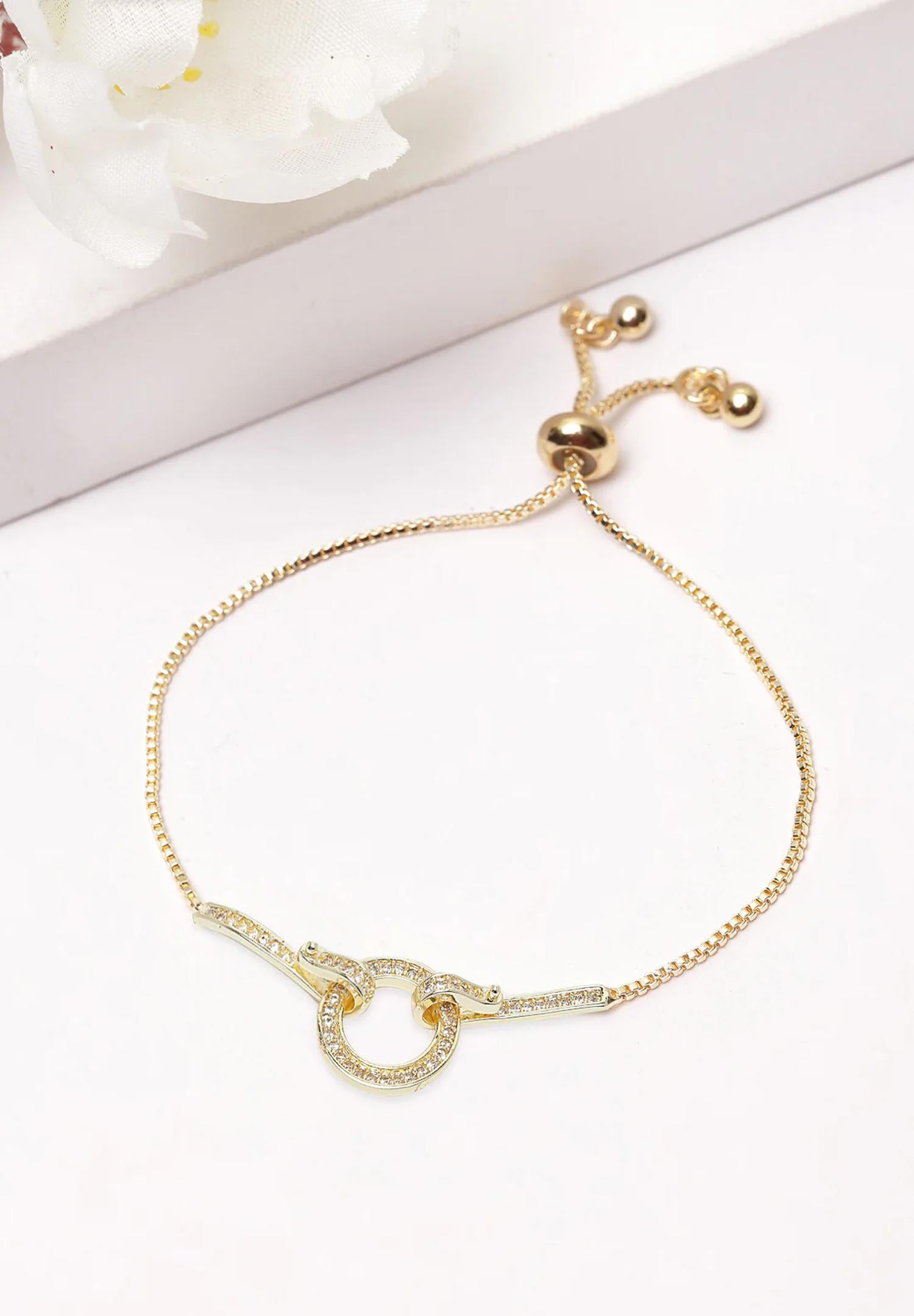 Guld kristallarmband